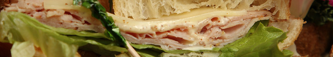Eating Deli Sandwich at Goldbergs Fine Foods - West Paces restaurant in Atlanta, GA.